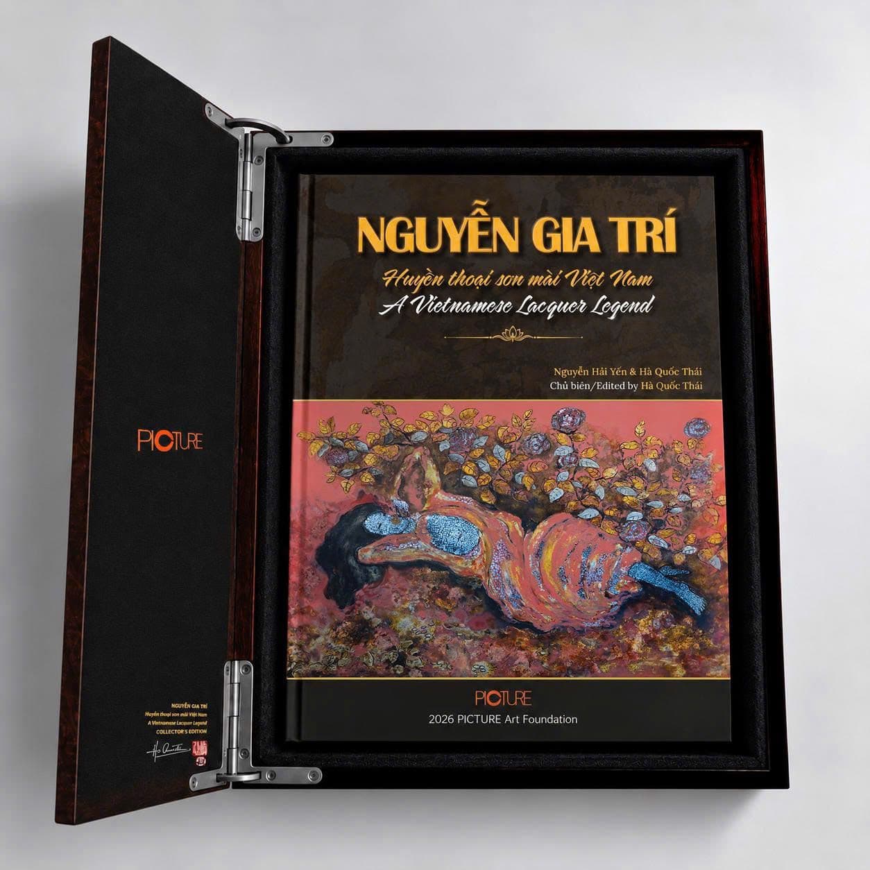 The Collector's Edition presentation box open on its hinges, the title and edition name set into the lining of the lid, with the hardcover volume seated in the case